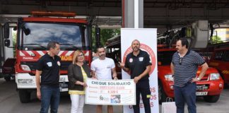 cheque bomberos solidarios para fibrosis quistica