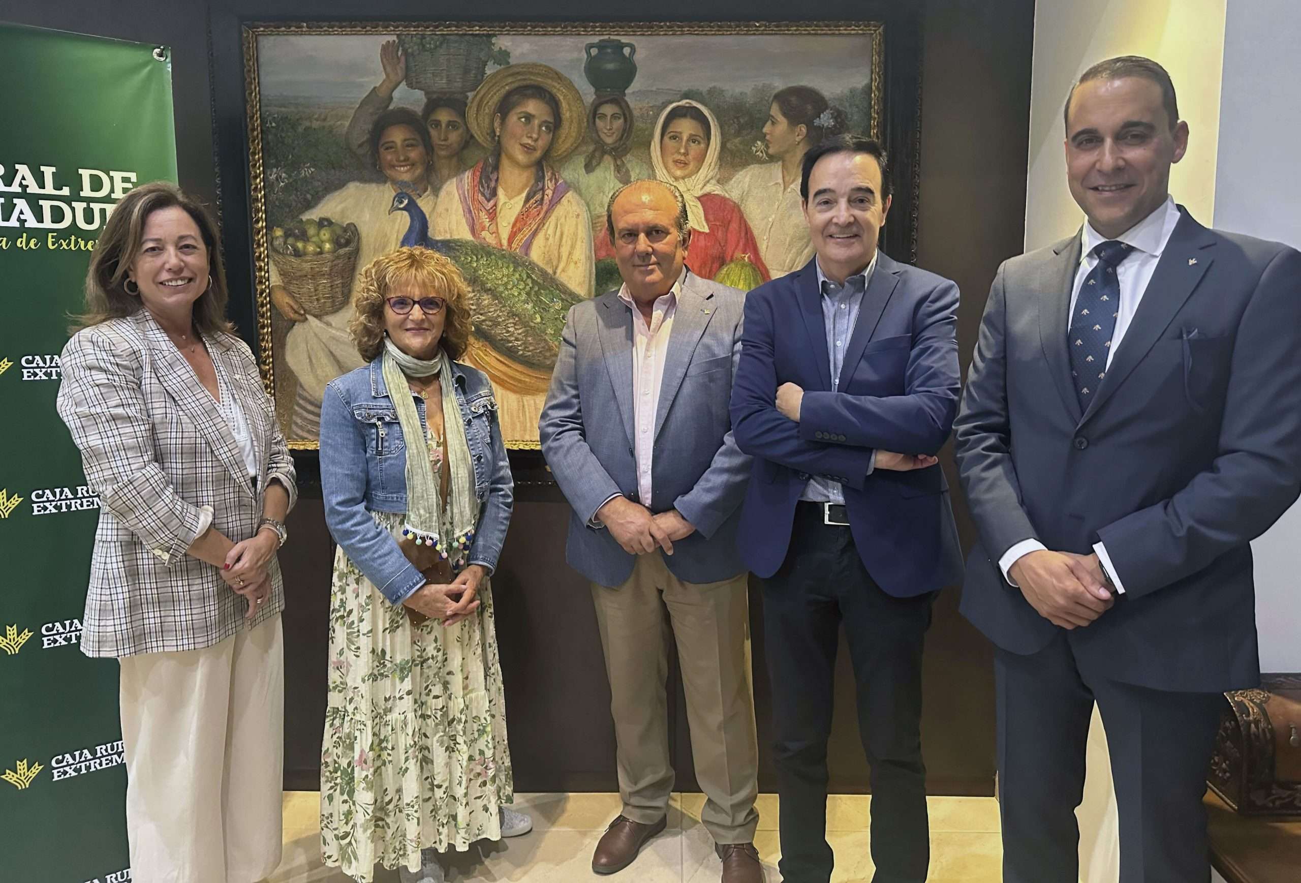 María Navarro, Manuela Calvo, Urbano Caballo, Jesús Gumiel y Juan Palacios, tras la firma del convenio con Cocemfe Badajoz. Foto: Cedida